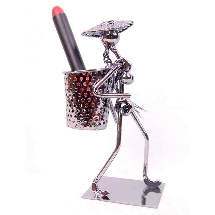 Steel Art Pen Holder (Man with Basket) Steel Art Pen Holder (Man with Basket)